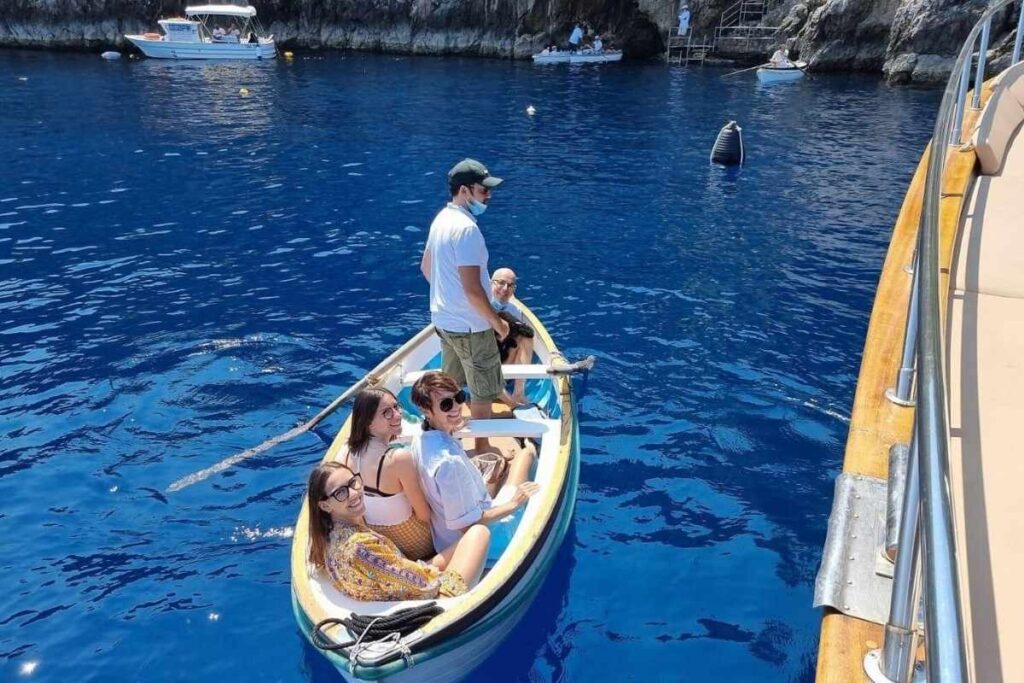Entering The Blue Grotto In Small Boats